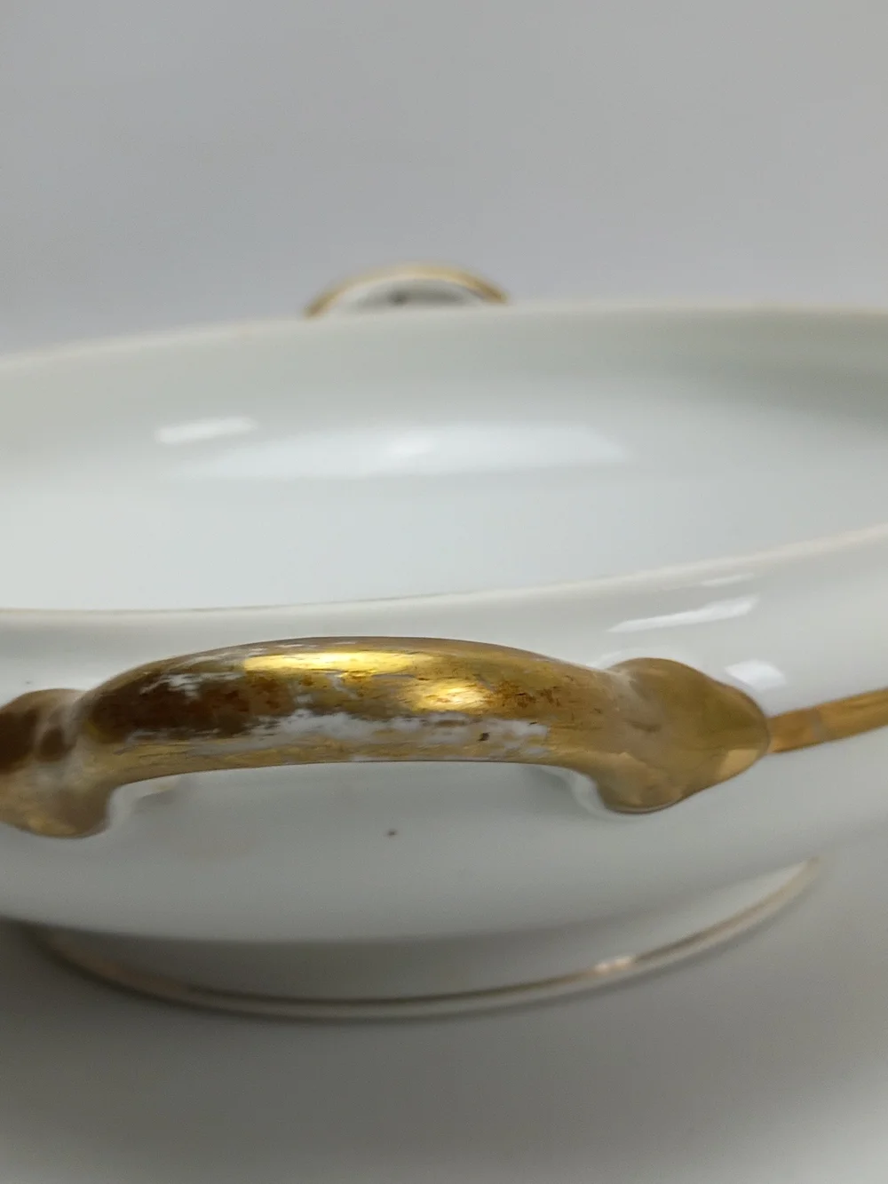 White Porcelain Covered Serving Bowl with Gold Handle